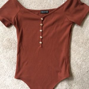 Never been worn, dark amber body suit from Rue21
